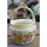 A Royal Worcester blush ivory pot, decorated with floral sprays, shape number 1880, height 3.75ins