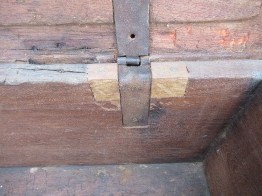 A 19th century hardwood Indonesian dowry chest, with two escutcheons and locking plates, having a - Image 6 of 9