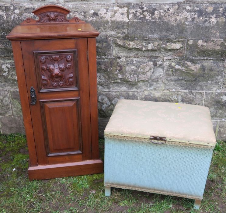 An Edwardian oak pot cupboard, with carved decoration to door and back, height 35ins, together