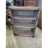 A 'Warwick' three section glazed bookcase, width 33ins x height 44ins x depth 11ins