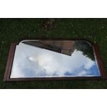 A 19th century mahogany boxwood line inlay over mantle mirror, with bevelled plate, width 51ins x