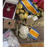 A collection of military buttons, cap badge and medals, the services medals engraved 112034 PNR.