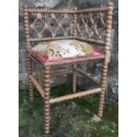 A bobbin turned corner chair