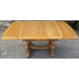 An oak drawer leaf dining table, 63ins x 36ins, height 30ins
