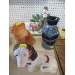 A Rye Pottery flat back figure of a farmer and a pig, together with two dog figures and a vase