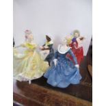 Four Royal Doulton figures, to include The Royal Governor's Cook