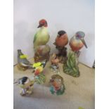 A Royal Worcester woodpecker model, and various other marked and unmarked Royal Worcester birds