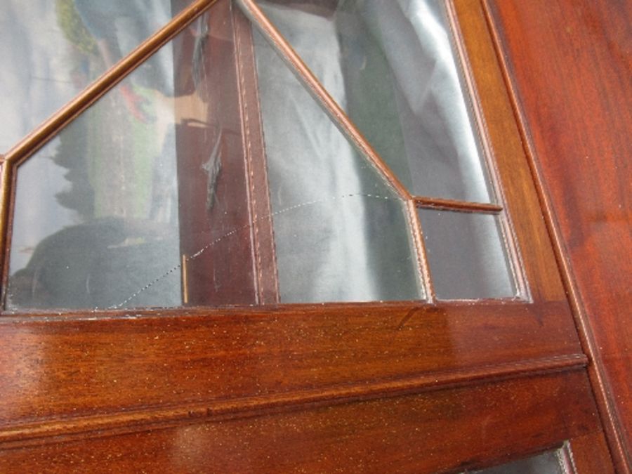 A 19th century glazed cabinet, with astragal glazed doors to top section, over two cupboard doors, - Image 2 of 4