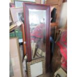A collection of mirrors and frames