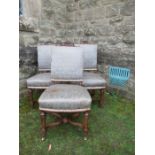 Three 18th century design walnut framed chairs, raised on turned legs united by wavy stretchers