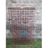 A  larg (144 bottle) wrought  iron wine rack, possibly 19th century