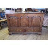An antique oak mule chest, width 56.5ins x depth 20.5ins x height 36ins