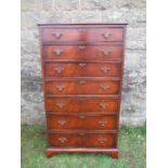 A tall mahogany chest of seven graduated drawers, raised on bracket feet, width 30ins x depth