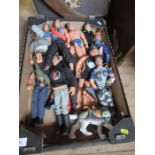 A box of Action Man figures, from the 1970's and 1980's