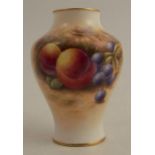 A Royal Worcester vase, decorated half round with hand painted fruit, by J Smith, shape number 2491,