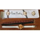 A Pierre Cardin quartz wrist watch, with three changeable straps, in carboard box