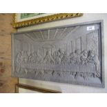 A metal plaque of the Last Supper