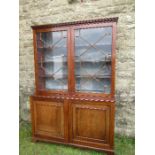 A 19th century glazed cabinet, with astragal glazed doors to top section, over two cupboard doors,