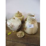 A Royal Worcester blush ivory pot pourri, lacking inner cover, a gilded example lacking outer cover,