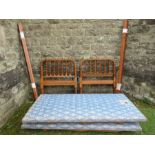 A pair of single beds, with bobbin  decoration all over, width 38ins x height 41ins x  length 80ins,