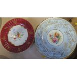 A Royal Worcester plate, decorated with roses by M Hunt, cracked, diameter 10.5ins, together with