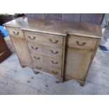 A break front walnut sideboard, width 41ins x depth 14ins x height 30ins