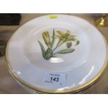 Four Royal Worcester plates, decorated with flowers