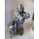 A metal model of a lady