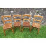 A set of four kitchen chairs
