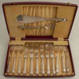 A cased set of hallmarked silver handled fish knives and forks, with EPNS blades, together with