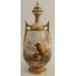 A Royal Worcester covered vase, decorated with sheep in highland landscape, by Harry Davis, having