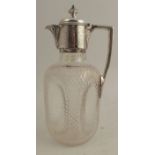 A Walker and Hall silver mounted cut glass claret jug, the dimple square glass body with but diamond