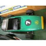 A green Lotus swing pedal racing car, 45” long x 25” wide, with solid rubber tyres