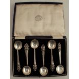 F.W Margrett & Co Bangkok, a cased set of six coffee spoons, with Deity to the terminal, together