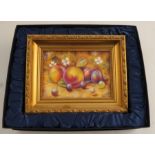 A Royal Worcester rectangular porcelain plaque, decorated with fruit to a mossy background by C