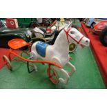 A swing pedal trotting horse and sulky, raised on 3 wheels, with string steering, 44” x 18” PLEASE