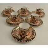 A set of six Royal Crown Derby 2451 pattern coffee cans, saucers and side plates, 18 pieces in