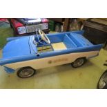 A Tri-ang,  blue and white pedal car, with swing pedals and solid rubber tyres, 44” x18”