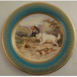 A 19th century Royal Worcester plate, the centre decorated with two terriers and dead game in
