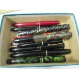 A collection of 15 fountain pens and propelling pencils, to include Mentmore, Parker, Mabie Todd,