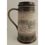 A Doulton Lambeth stoneware jug, decorated with a sgraffito band of cattle in landscape by Hannah