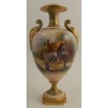 A Royal Worcester vase, decorated with a figure walking by a thatched cottage, by R Lewis, shape