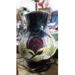 A bulbous body Moorcroft vase, formed as a table lamp