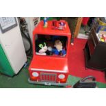 A red rotary pedal car, in the style of Postman Pat's van - please note revised estimate