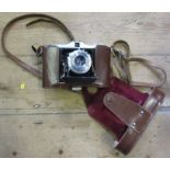 A Nettar camera, the lens marked Prontor-s Novar-Anastigmat 1:45 f=75mm, in leather case