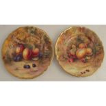Two Royal Worcester plates, decorated with hand painted fruit to a mossy ground by Horace Price,