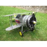 A Superb Bi-plane, pedal operated with solid rubber tyres,  wing span 48” x length 60”