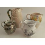 A group of four water jugs, to include Sunderland lustre and three Victorian examples -