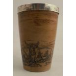 A 19th century Doulton Lambeth salt glazed beaker, decorated with cattle, with a solid silver rim by