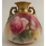 A Royal Worcester vase, decorated with red and pink roses, shape number H155, height 3.5ins